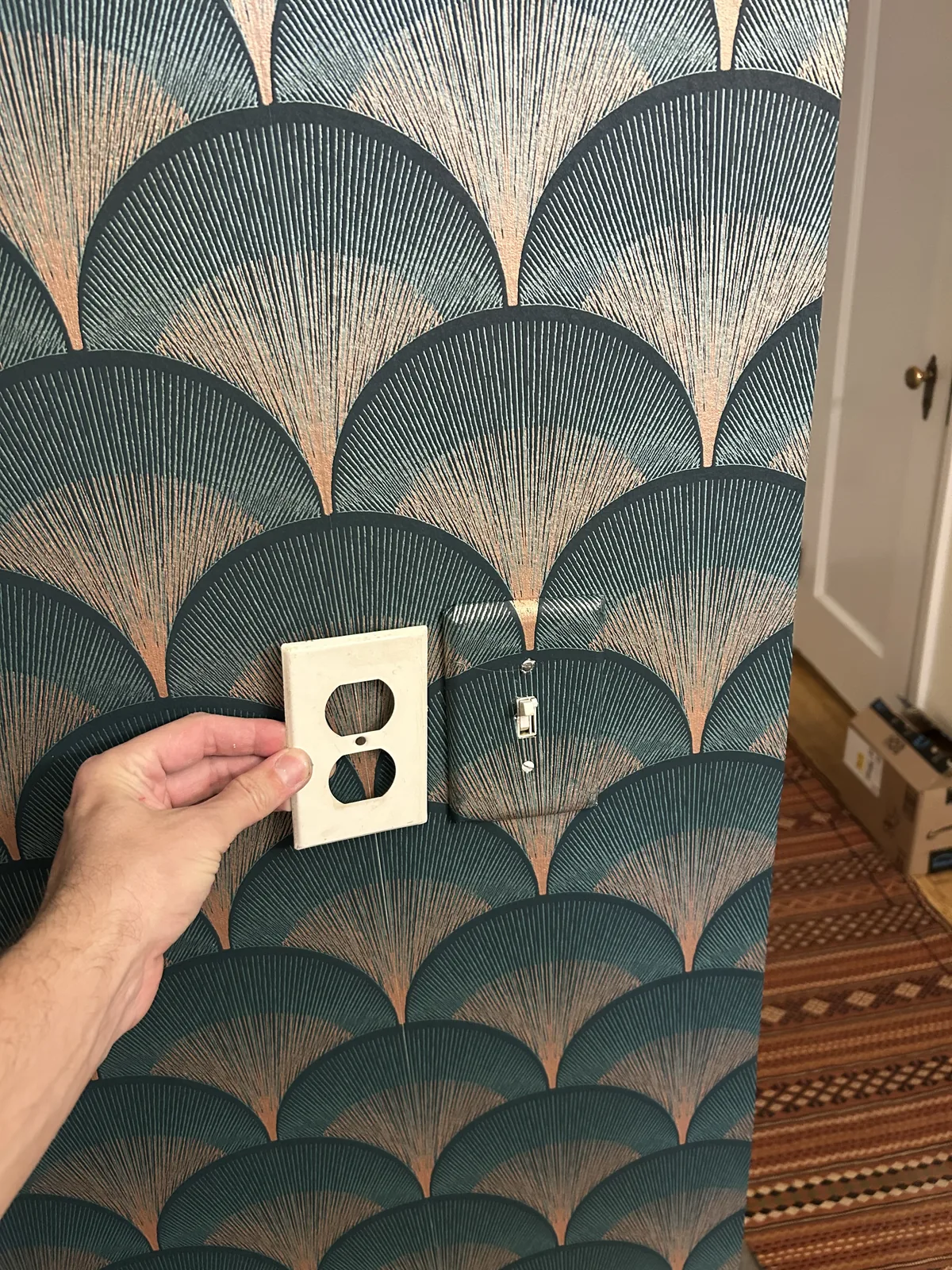 Master artisan pattern-continuity outlet and switch plate wrapping — ProKir Design
