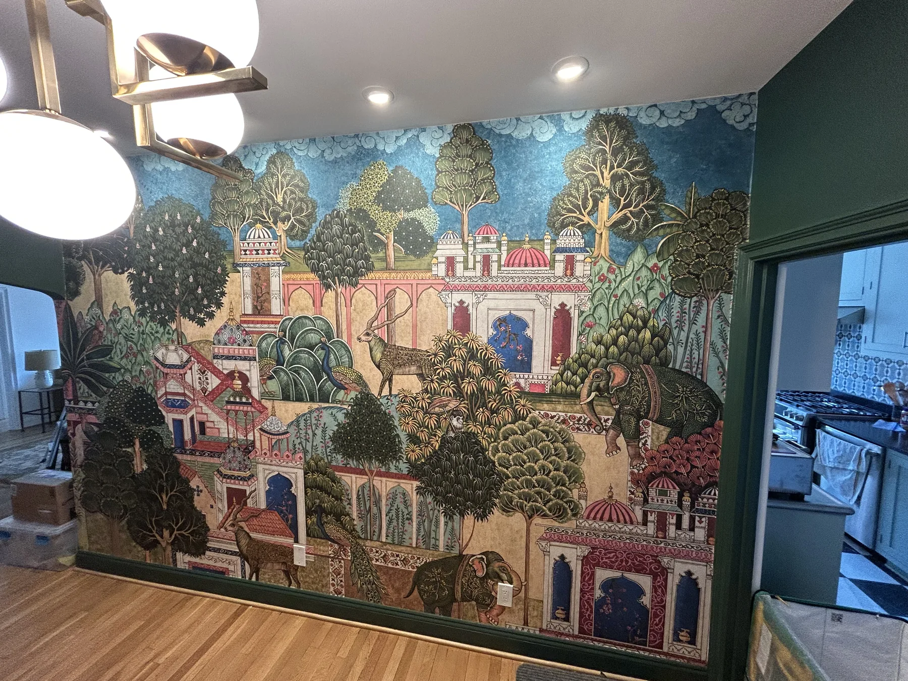Scenic panoramic Mughal palace garden mural installation in dining room