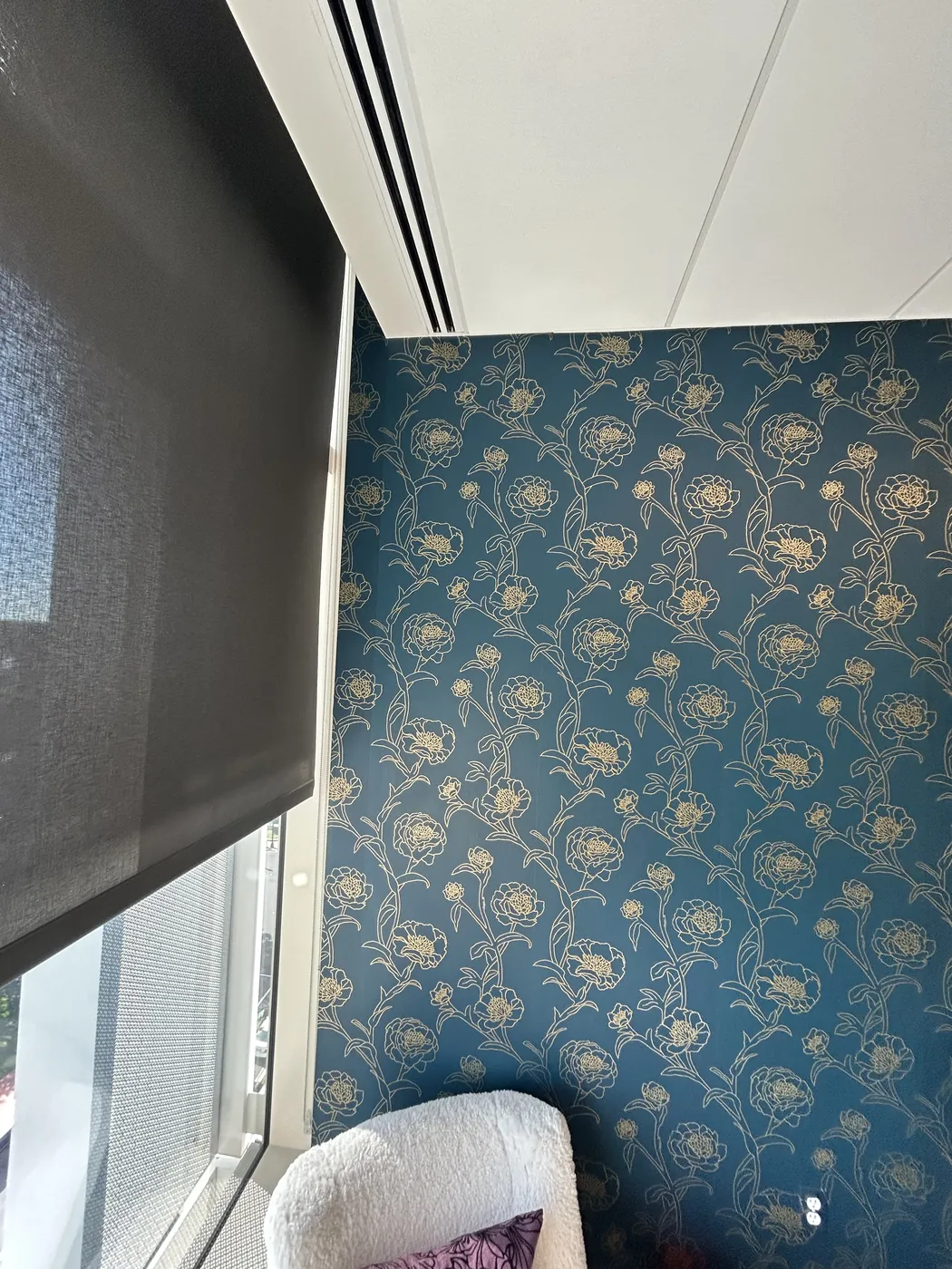 Teal and gold floral wallpaper on a bedroom wall — wallpaper installation by ProKir Design