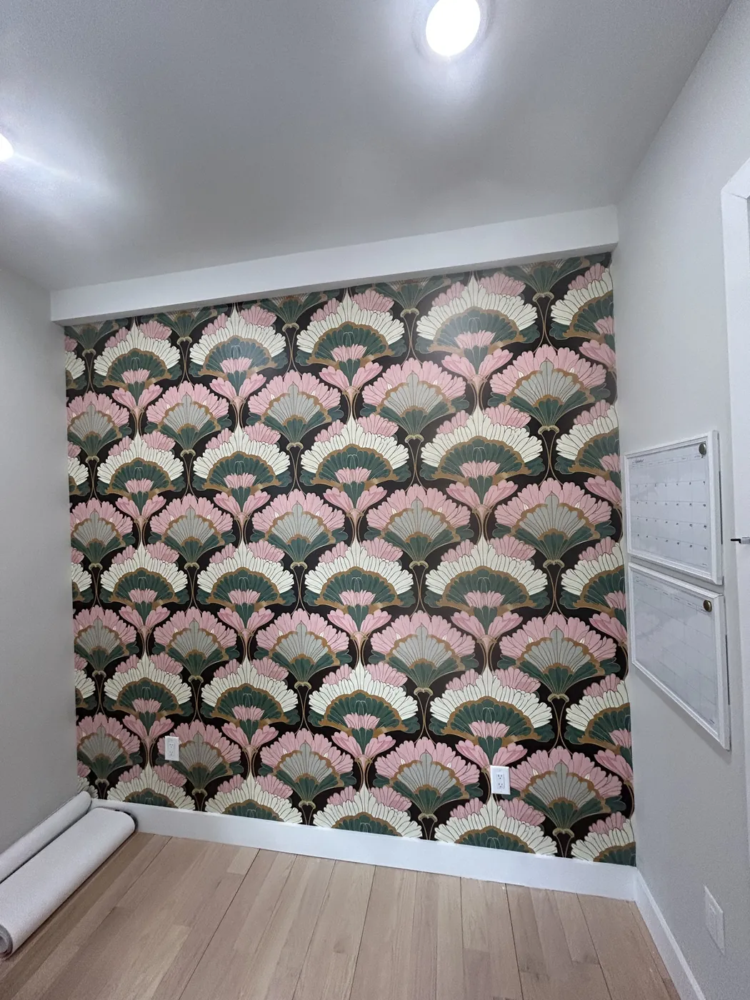 Pink and green fan pattern accent wall — wallpaper installation by ProKir Design