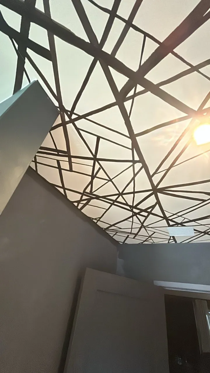 Abstract black line wallpaper in a stairwell — wallpaper installation by ProKir Design