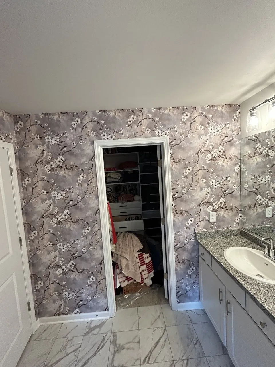 Lilac blossom wallpaper in a bathroom — wallpaper installation by ProKir Design