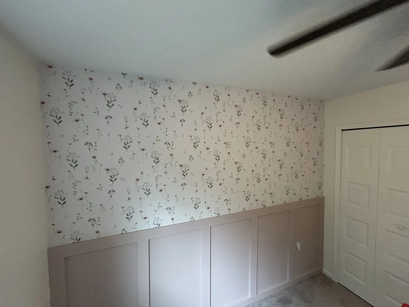 Small floral wallpaper above painted wainscoting — wallpaper installation by ProKir Design