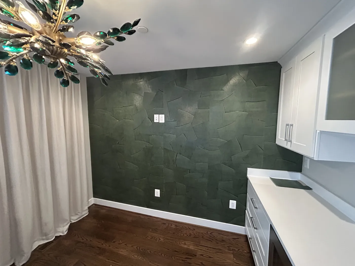 Green grasscloth wallcovering in a kitchen — wallpaper installation by ProKir Design