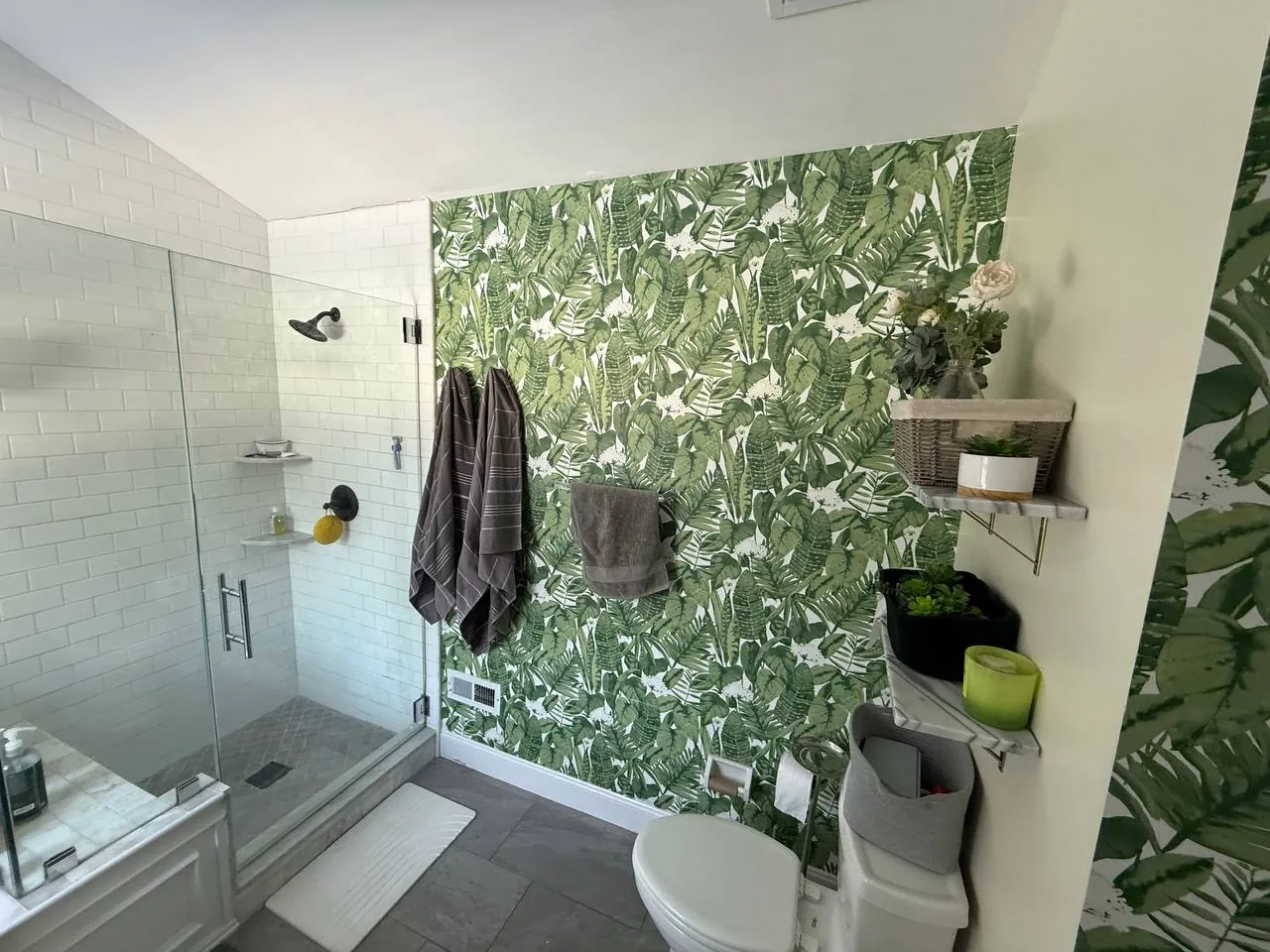Banana leaf wallpaper in a bathroom — wallpaper installation by ProKir Design
