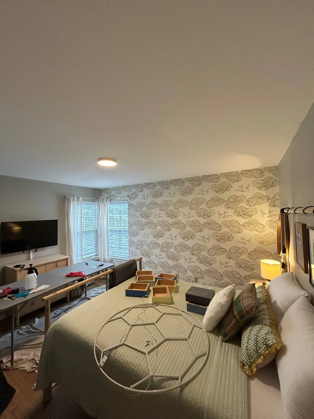 Patterned feature wall in a bedroom — wallpaper installation by ProKir Design