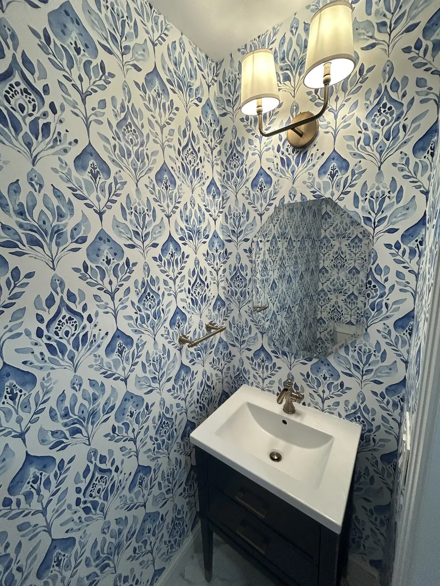 Powder room — Mediterranean blue and white toile wallpaper installation