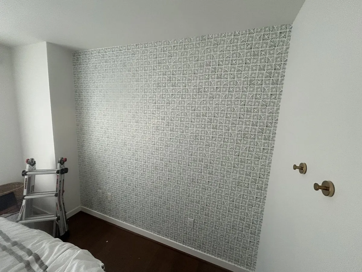 Boutique corporate suite — geometric metallic line wallcovering