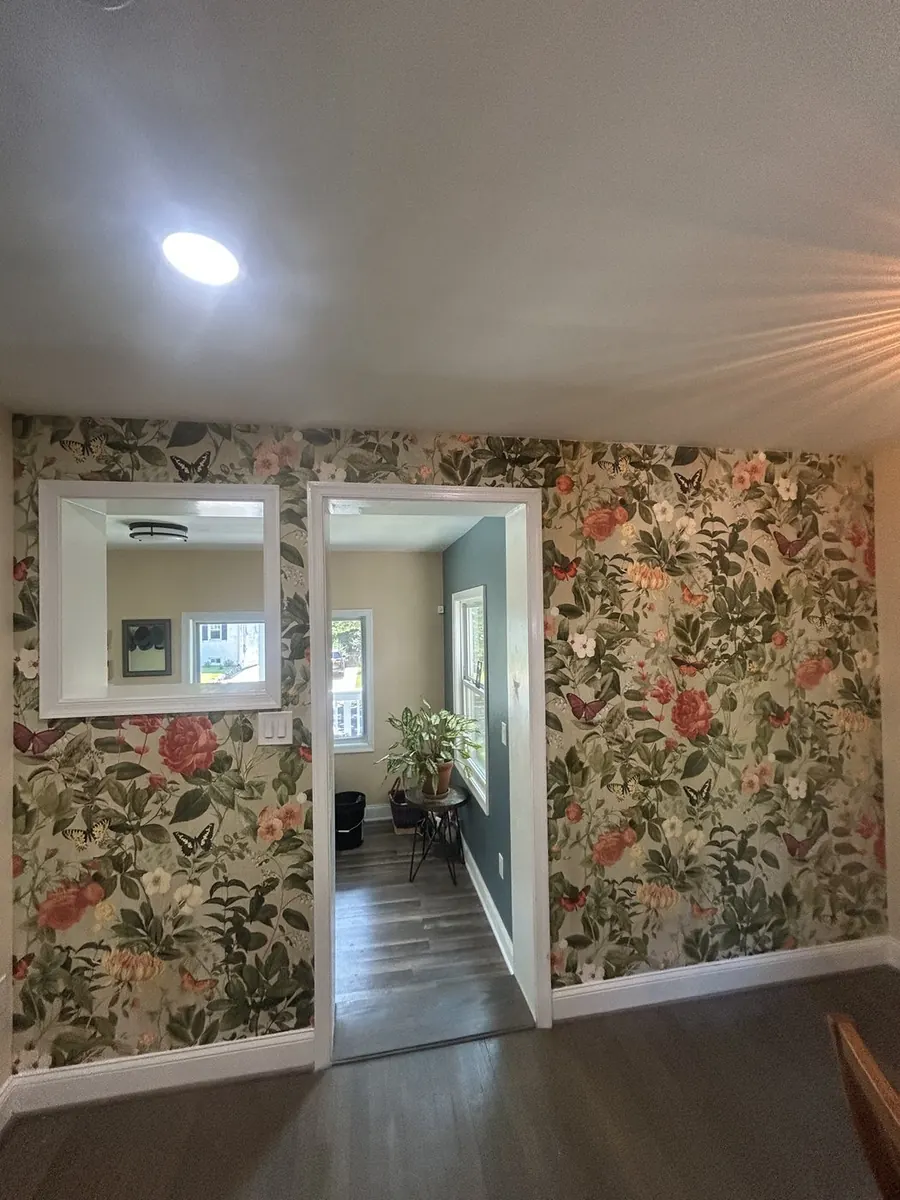 Dining room and foyer — English cottage garden floral wallpaper