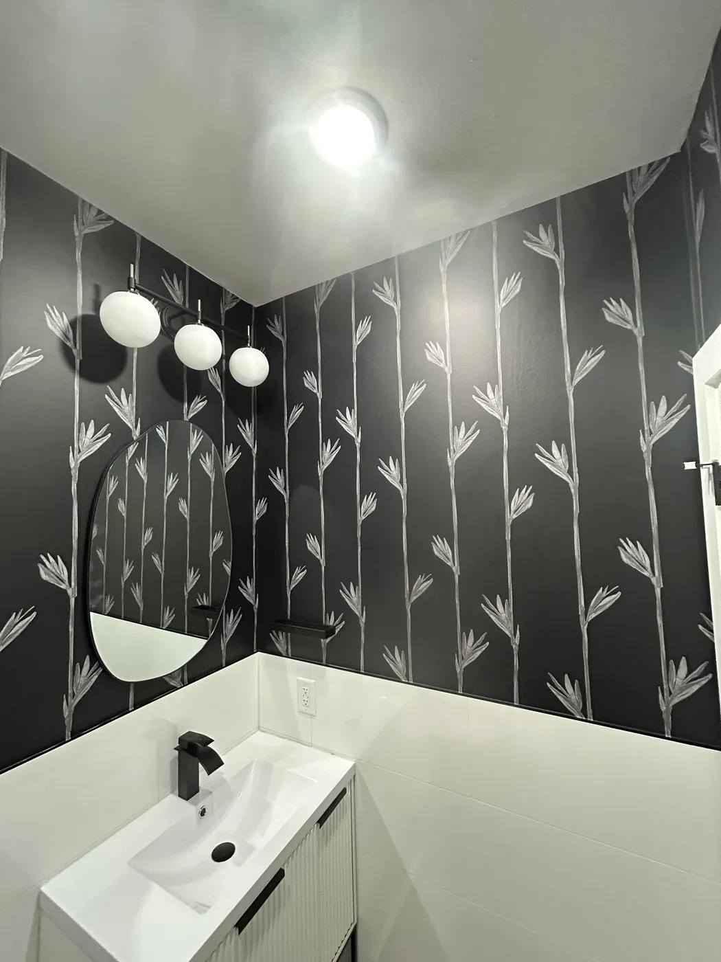 Black and white bamboo wallpaper in a modern bathroom, Hudson County, NJ — wallpaper installation by ProKir Design