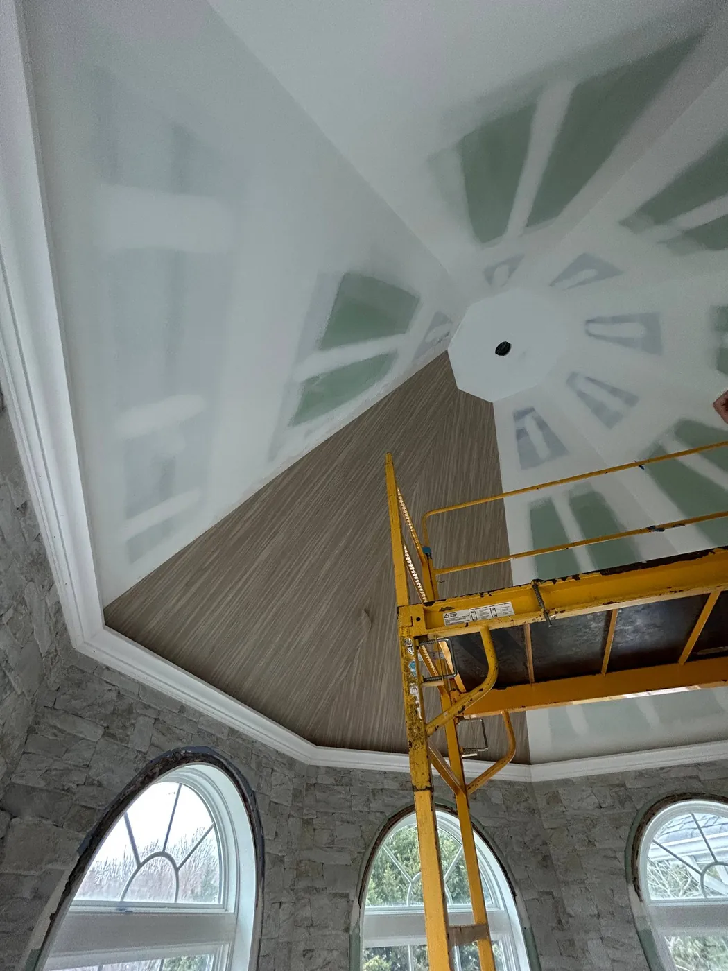 Rolling scaffold set up to wallpaper a domed ceiling — wallpaper installation by ProKir Design