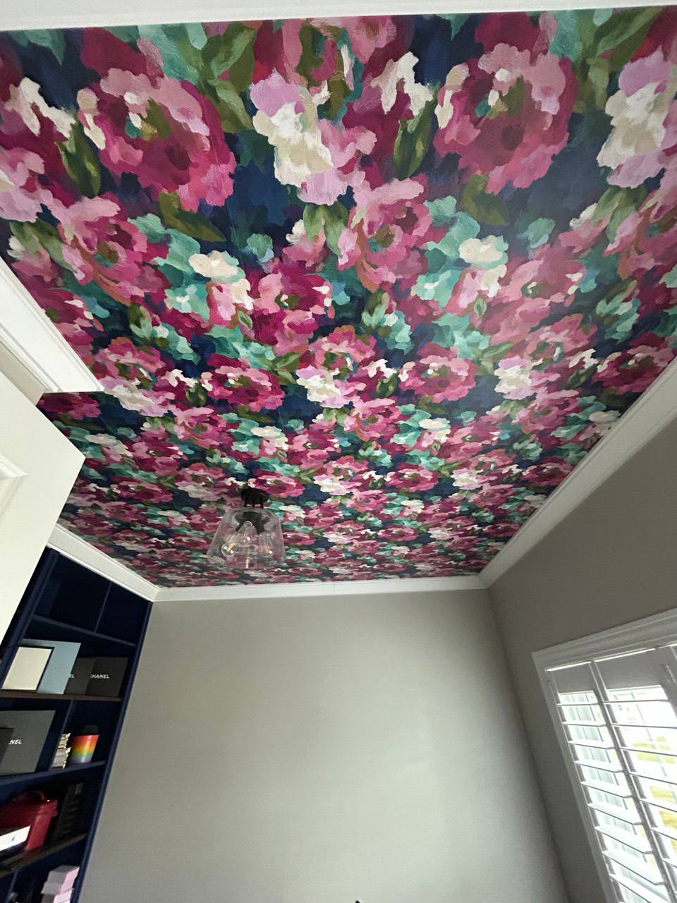 Colorful floral ceiling wallpaper installation