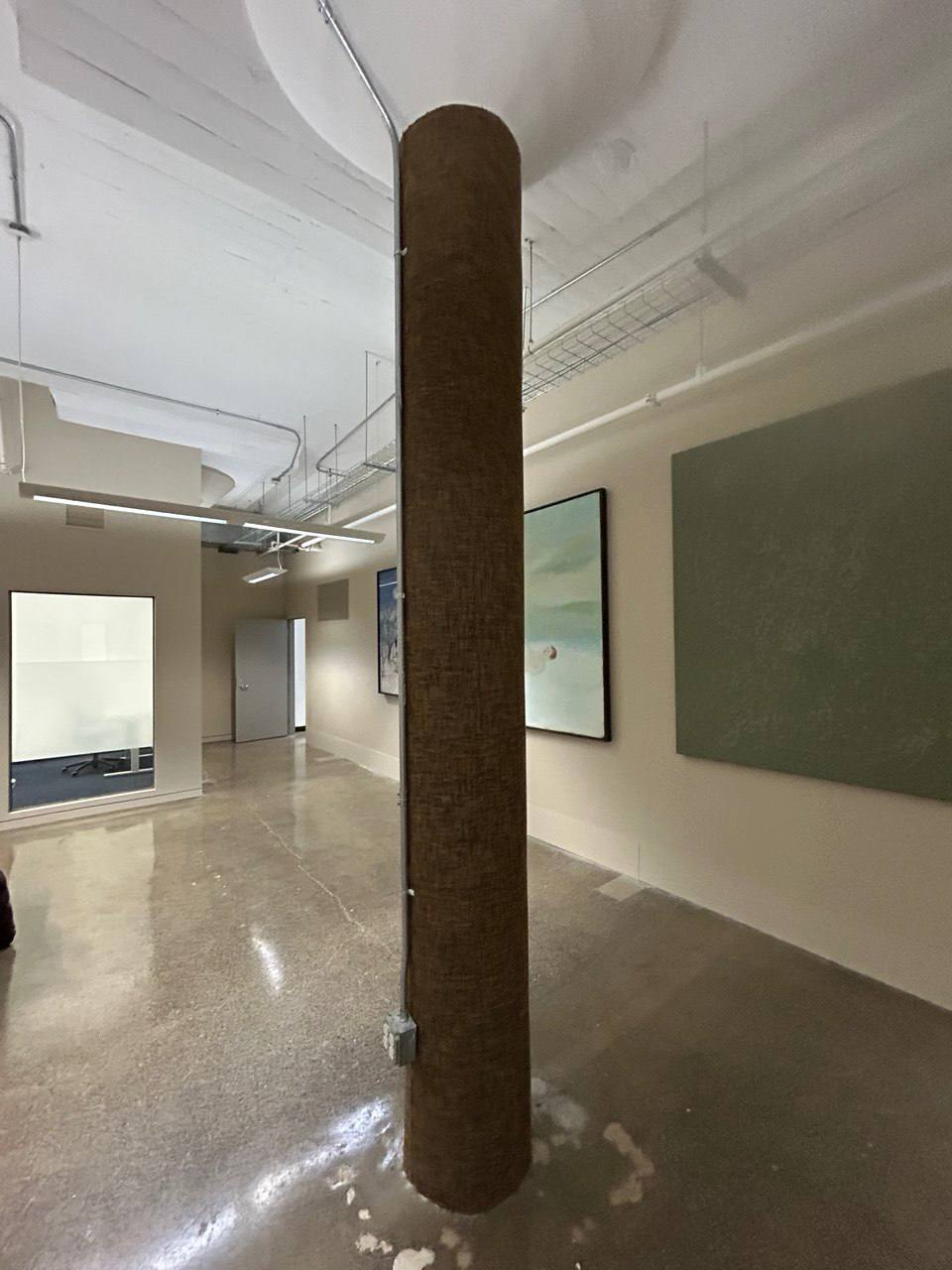 Commercial column wrapping with textured wallcovering
